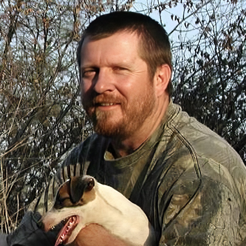 A man smiling at the camera.