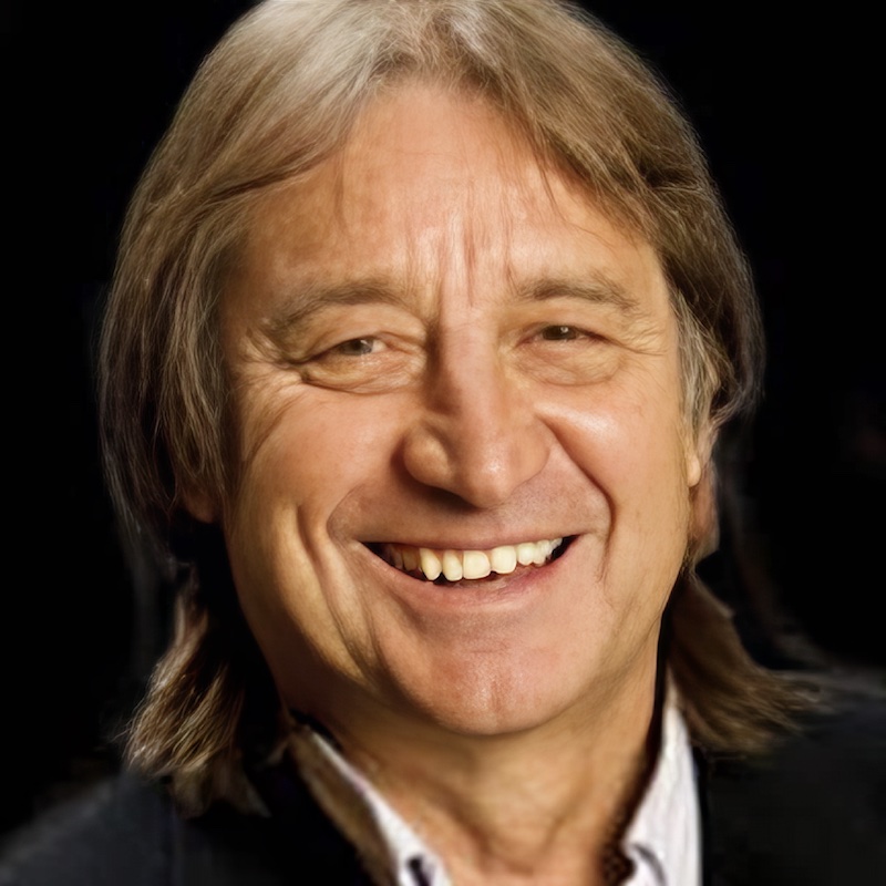 A man smiling at the camera.